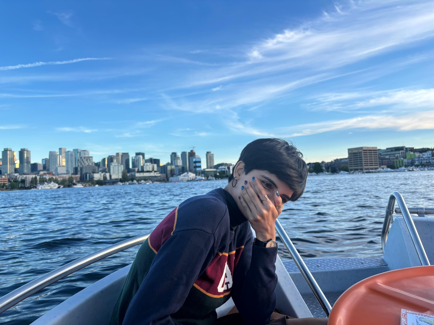 Sharayu on a boat, Seattle skyline